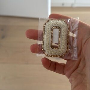 Stoney clover lane varsity letter O